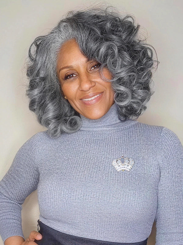 Stylish silver gray curly wig for older women, soft layered salt and pepper human hair wig with natural volume.