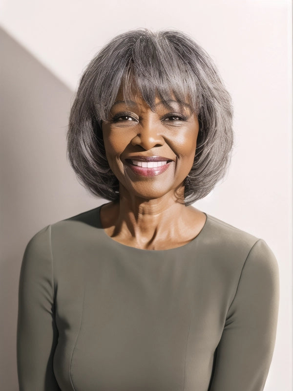 Black woman wearing Luvwin Salt & Pepper Layered Short Bang Wig, soft natural layers, realistic gray highlights, inner buckle for secure fit, beginner-friendly and easy-to-style wig for work, weekend, or casual occasions