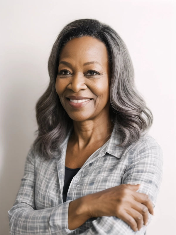 Black woman wearing Luvwin Dark Gray Salt & Pepper Custom Wavy Hair Bob Wig, soft natural waves, realistic gray highlights, glueless human hair wig suitable for senior women and mature adults, ideal for brunches, social occasions, or casual events