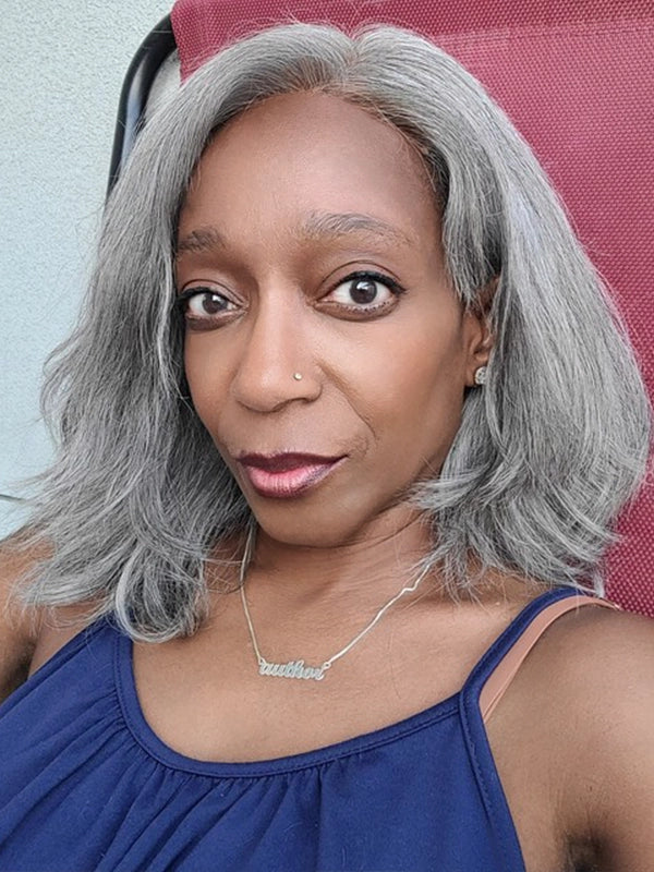 African American woman in Luvwin Gray Color Layered Wig with Salt & Pepper highlights, soft natural layers, glueless lace front, 100% human hair, beginner-friendly wig for stylish Black women