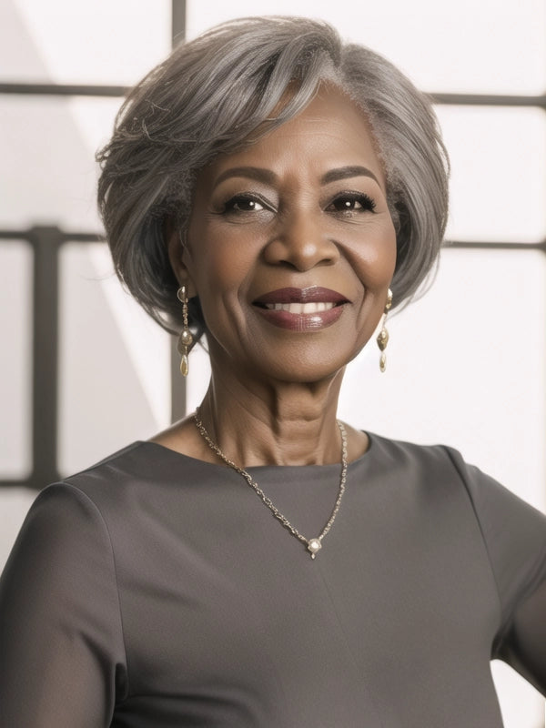 African American woman in Luvwin Salt & Pepper Pixie Cut Side Part Glueless Wig, soft natural pixie cut, realistic gray highlights, glueless 5x5 closure, 100% human hair, beginner-friendly wig suitable for everyday and casual wear