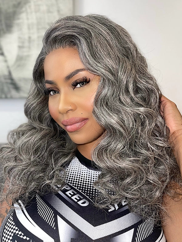 Black woman showcasing Luvwin Loose Wavy Kinky Hair Gray Color Wig, soft natural waves, realistic gray highlights, glueless 5x5 closure, comfortable human hair wig perfect for work, weekend, or casual outings