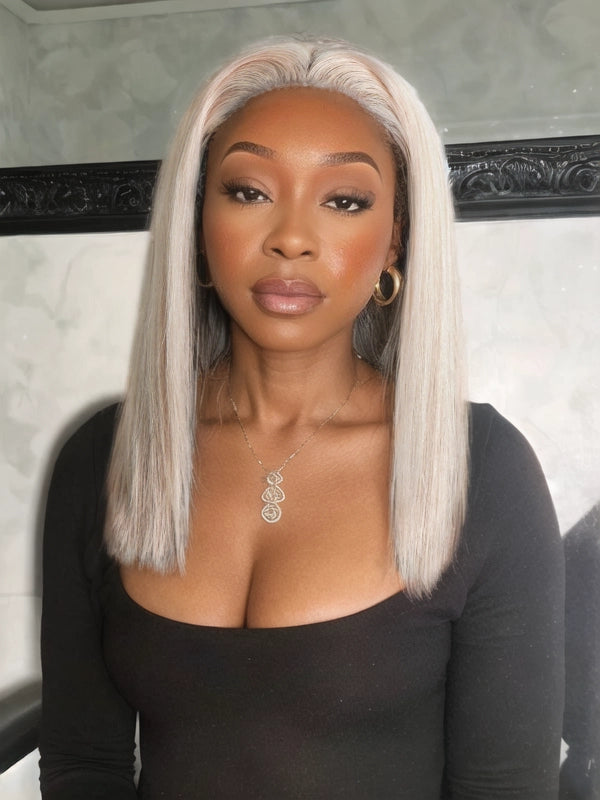 African American woman wearing Luvwin 5x5 Lace Bob Wig in 95% White Salt & Pepper Platinum Blonde, sleek straight style, realistic gray highlights, 100% human hair, beginner-friendly and easy-to-style for everyday, work, or casual occasions