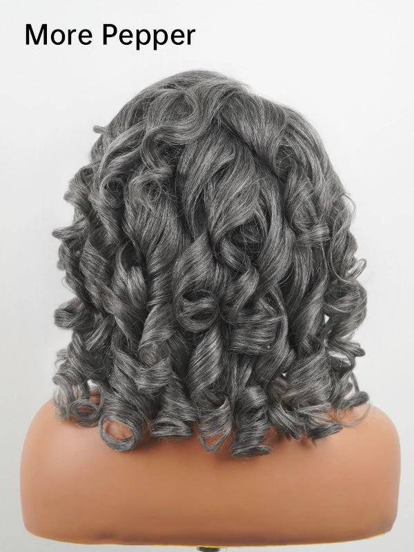 Back view of dark salt and pepper kinky wavy curly wig, black and gray human hair wig with full layered volume.