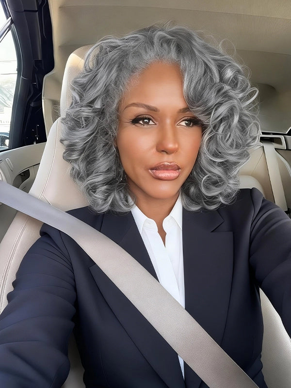 Salt and pepper kinky curly gray wig on mature woman, natural looking glueless human hair wig for professional office style.