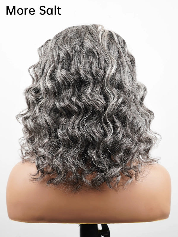 Back view of More Salt version Salt and Pepper Gentle Loose Curly Grey Bob Wig, showing soft layered curls and natural grey blend, realistic short curly wig for women seeking a classy and natural hairstyle.