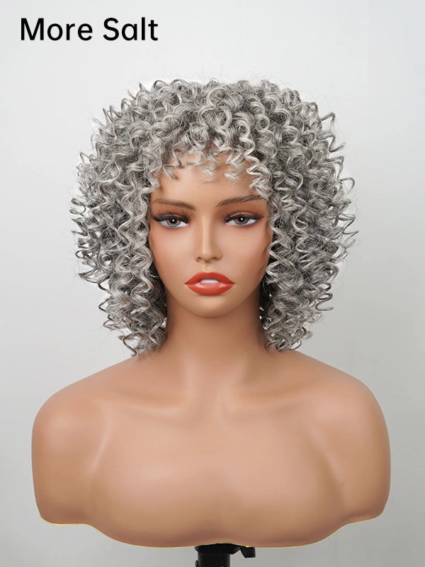 A close-up of a stylish woman with a trendy salt and pepper curly wig, featuring full bangs. Ideal for adding volume and a fashionable touch to any outfit.