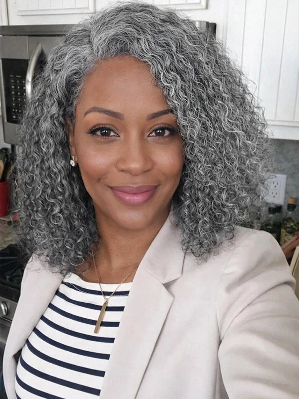Close-up of a woman wearing a deep curly salt and pepper gray bob wig, glueless and pre-cut lace, natural-looking style for everyday wear.