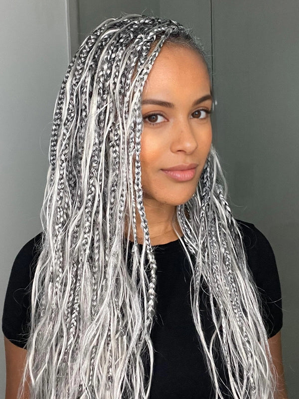Long salt and pepper crochet box braids in gray and white blend, human hair extensions for Black women.