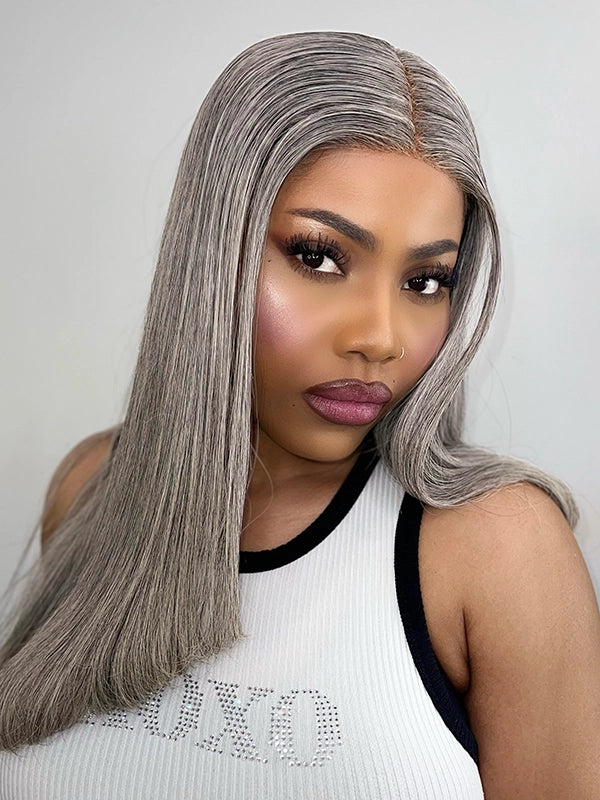 Mature African American woman wearing Luvwin Gray Straight Layered Cut Wig, soft natural layers, realistic Salt & Pepper highlights, glueless lace front, 100% human hair, stylish and easy-to-wear wig for Black women