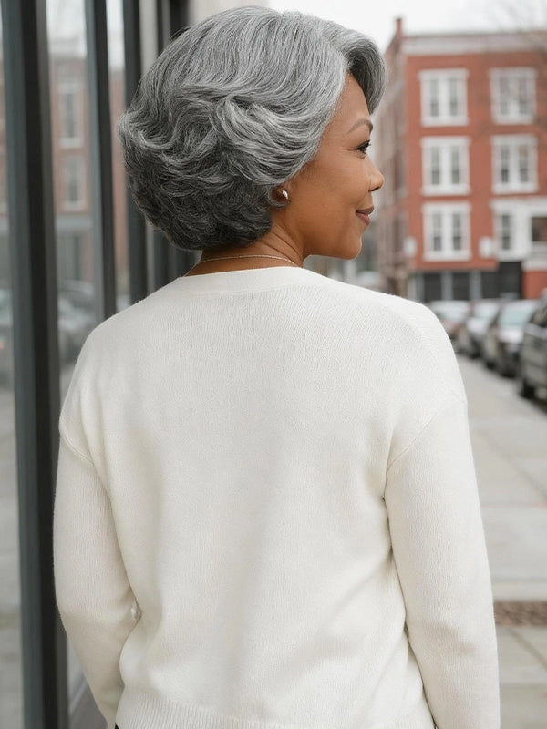 Black woman wearing Luvwin 5x5 Salt & Pepper Gray Color Retro Elegant Wave Wig, soft natural waves, realistic gray highlights, pre-cut lace, easy-to-style human hair wig suitable for work, weekend, or casual occasions