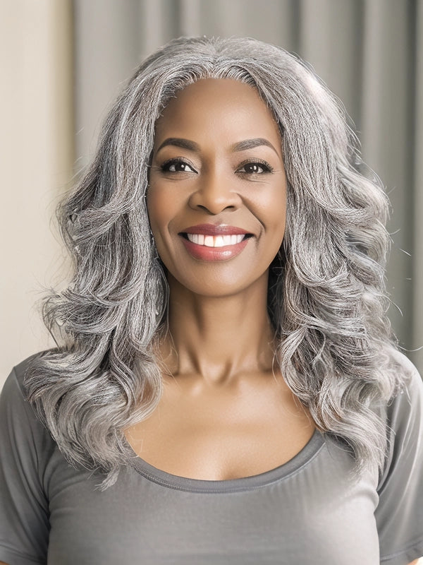 African American woman wearing Luvwin Ready To Go Custom Layered Wavy Cut with Bangs Salt & Pepper 13x4 Frontal Glueless Wig, soft layered waves, realistic gray highlights, 100% human hair, beginner-friendly wig suitable for mature women and women of all ages, ideal for brunches, social events, or casual outings