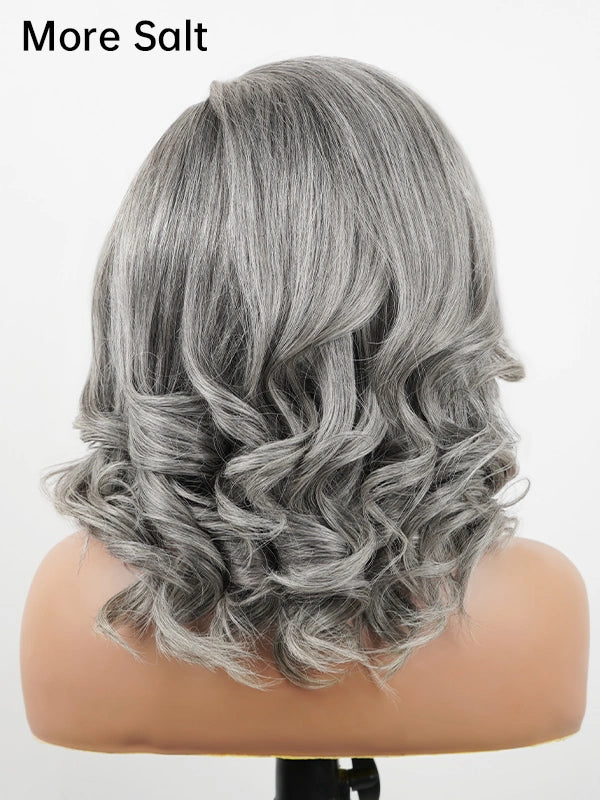 Back view of Luvwin More Salt salt and pepper layered blowout wave wig, 100% human hair gray wig with soft curls, natural volume and elegant shine for women.