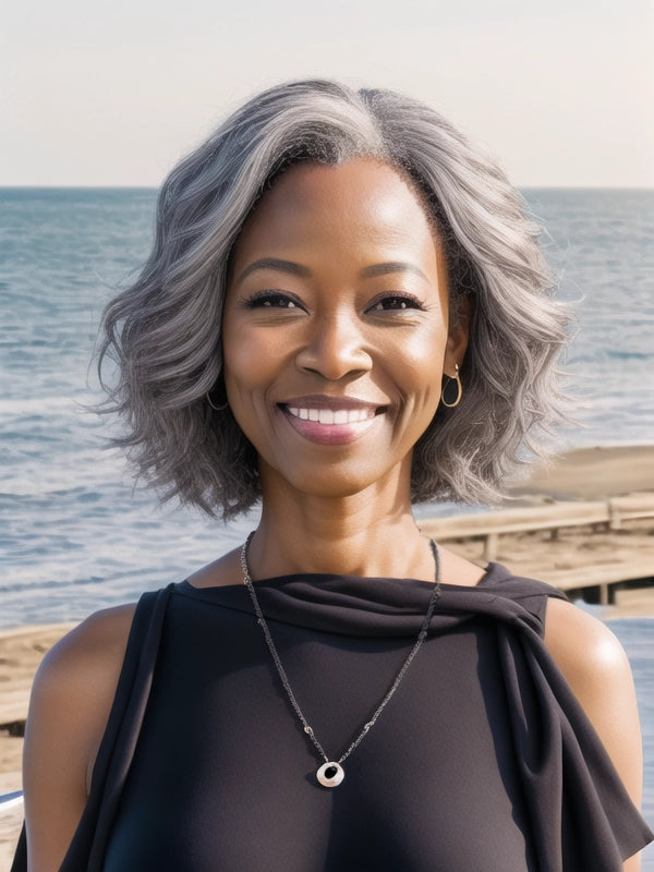 Black woman showcasing Luvwin Gray Color Short Layered Loose Wave Glueless Wig, realistic Salt & Pepper highlights, soft natural waves, pre-cut 5x5 lace, comfortable human hair wig for stylish everyday or casual looks