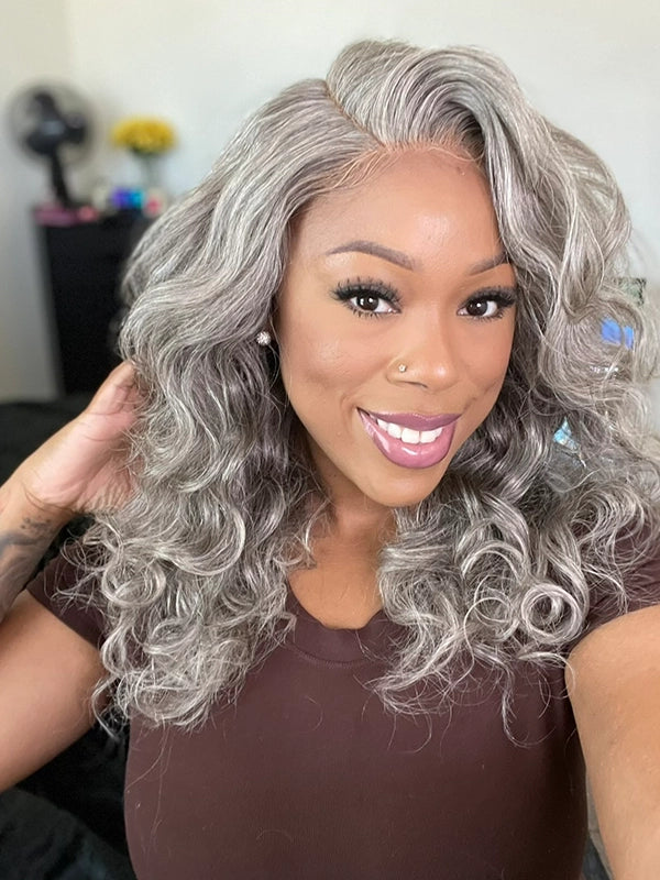 African American woman wearing Luvwin Salt & Pepper Loose Wave 5x5 Closure Glueless Wig, soft natural waves, realistic gray highlights, 100% human hair, beginner-friendly and easy-to-style wig for everyday and casual wear
