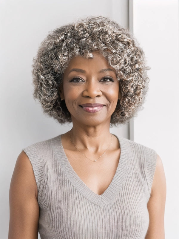 African American elderly woman wearing Luvwin Full Machine Salt & Pepper Pixie Cut Curly Hair Wig with Bangs, soft defined curls, glueless wig without lace, beginner-friendly 100% human hair, suitable for mature and elderly women, ideal for brunches, casual outings, family gatherings, or social events