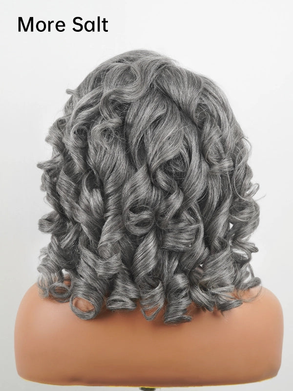 Back view of more salt silver gray kinky wavy curly wig, full volume human hair wig with layered curls.