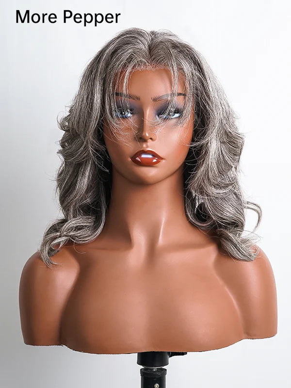 Front view of Salt and Pepper More Pepper Glueless Gray Layered Cut Body Wave Bob Wig – dark silver grey short wavy lace front wig for women seeking a natural and elegant look